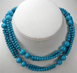 Beautiful Endless Synthetic Turquoise Necklace. 10mm beads alternating with 3-rows of 4mm beads. Necklace is 30" long