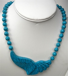 Beautiful Synthetic Turquoise Necklace. 8mm beads, knotted. Unique large 80x40mm ornament. Necklace is 32 inches long