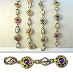 Filigree Caged Lucite & Pearl Chain Crystal lucite stones in gold plated filigree setting, 13mm with alternating caged pearls, sold in 10 Feet minimum lengths. Available in four colors, Amethyst, Rose, Fuchsia & Multi.