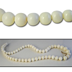 Genuine graduated white coral with hint of angel skin coral color too!  5mm - 7.5mm sold by the strand-- approximately 70 beads per strand