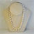 Wholesale Pearl Necklace Elegant 10mm pearl necklace, 18".Comes in Peach, Pink & Cream. (1 dozen minimum)