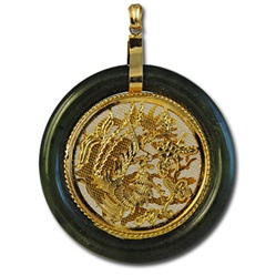 Genuine Jade Pendant  Fascinating genuine jade round pendant, with filigree oriental design. 2" wide.