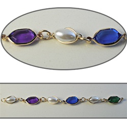 Hexagon & Pearl Crystal Lucite Chain Multi colored crystal lucite stones in silver plated setting. 8 colored stones with alternating 8mm pearls, sold in 10 Feet minimum lengths.