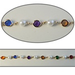 Octagon & Pearl Crystal Lucite Chain Multi colored crystal lucite stones in silver plated setting. 8 colored stones with alternating 8mm pearls, sold in 10 Feet minimum lengths.